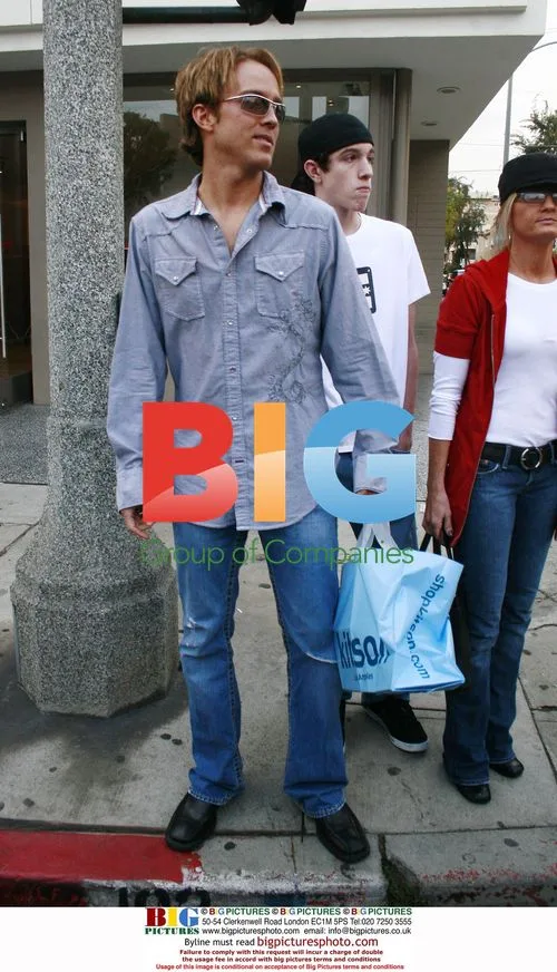Larry Birkhead shops at Kitson boutique