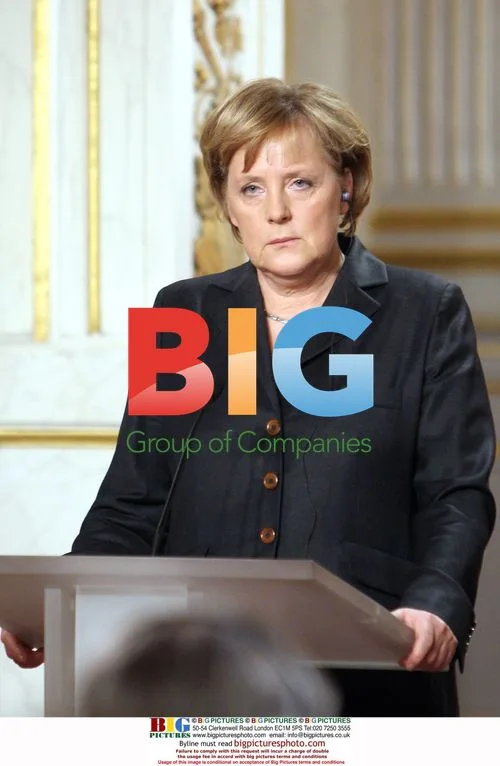 Sarkozy Meets Merkel at Palais de l'Elysée
