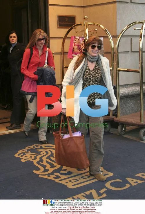 Celebs sign autographs outside Ritz Carlton