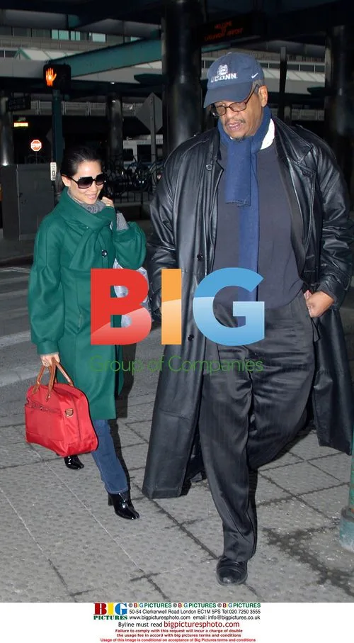 Lucy Liu Arrives at La Guardia with Bodyguard