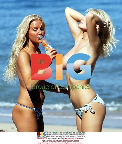 Models Anna Taverner and Michelle Marsh relax in France