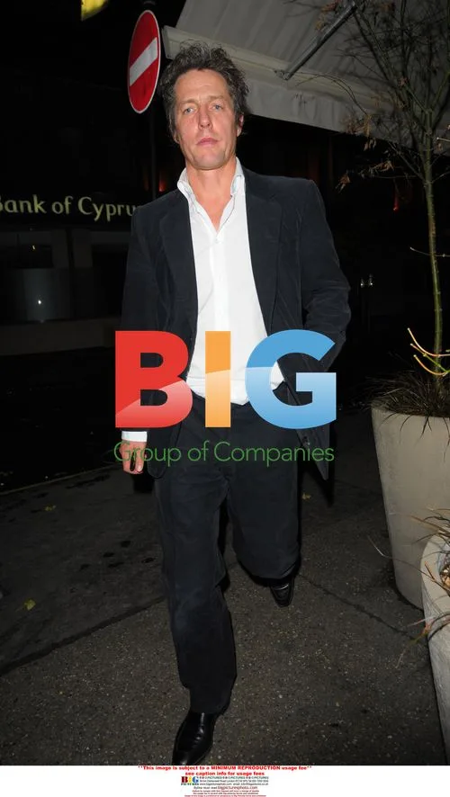 Hugh Grant spotted out with mystery woman