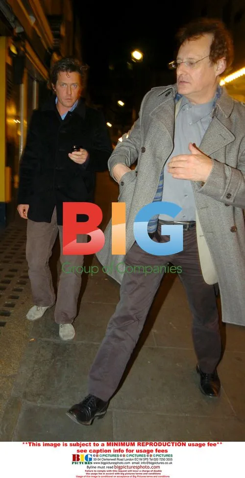 Hugh Grant and friends leave restaurant