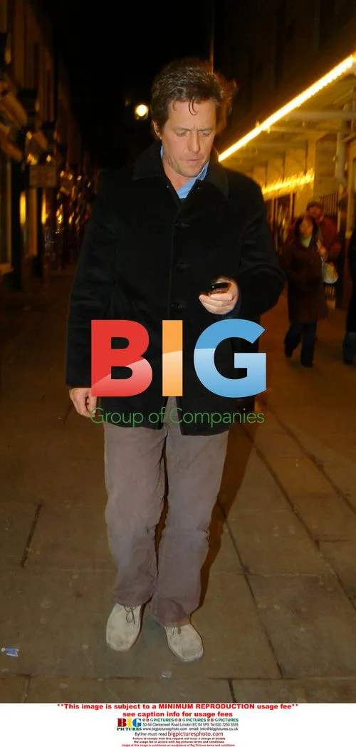 Hugh Grant leaves J Sheekey with friends