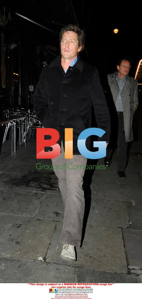 Hugh Grant and friends leave restaurant