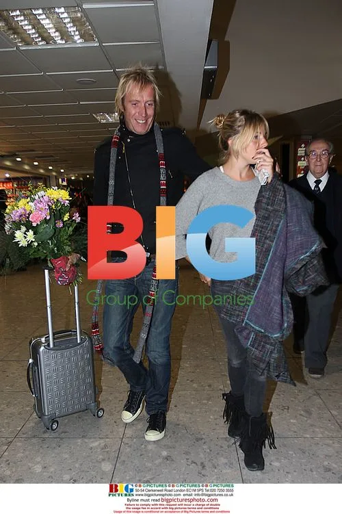 Rhys Ifans meets Sienna Miller at Heathrow