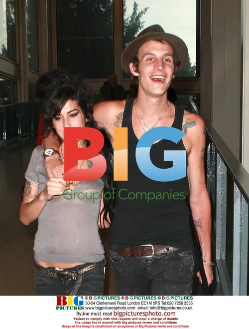 Amy Winehouse and Blake Fielder-Civil Arriving at Gatwick