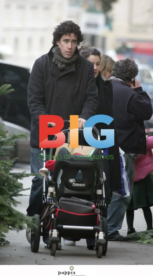 Stephen Mangan and family out in London