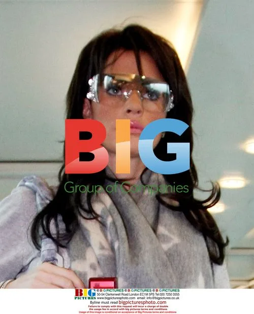 Katie Price Arriving at Airport After Breast Reduction