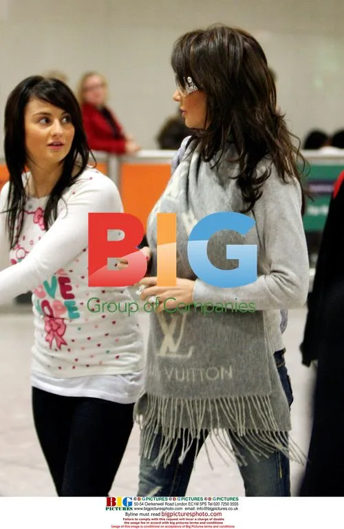 Katie Price arrives at London airport