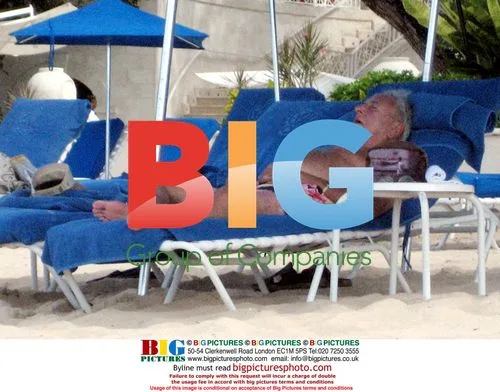 Michael Winner dozing in the Caribbean