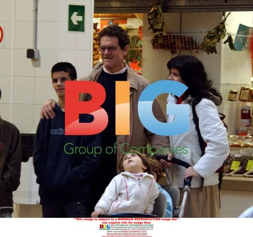 Fabio Capello shopping with family