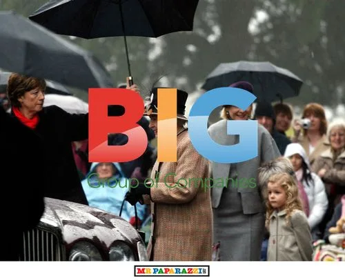 The Queen braves rain for Christmas service