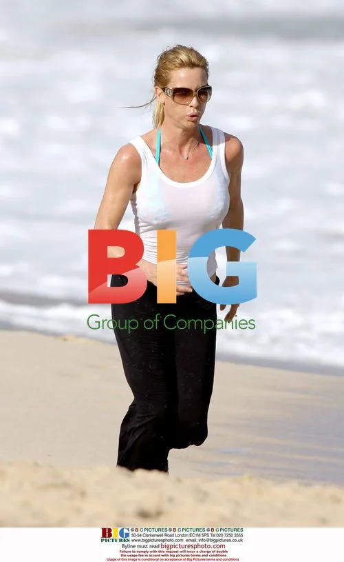 Nicollette Sheridan Jogging on Caribbean Beach