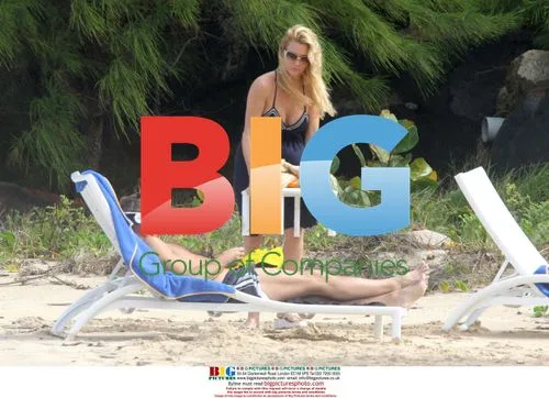 Nicolette Sheridan applies sun lotion in Saint Barthelemy