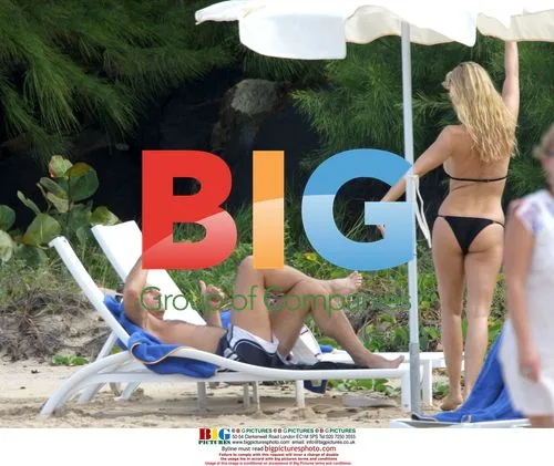Nicolette Sheridan Applies Sunscreen with Michael Bolton