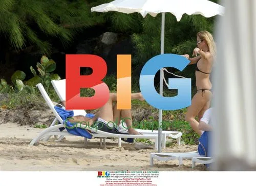 Nicolette Sheridan Applying Sunscreen with Michael Bolton