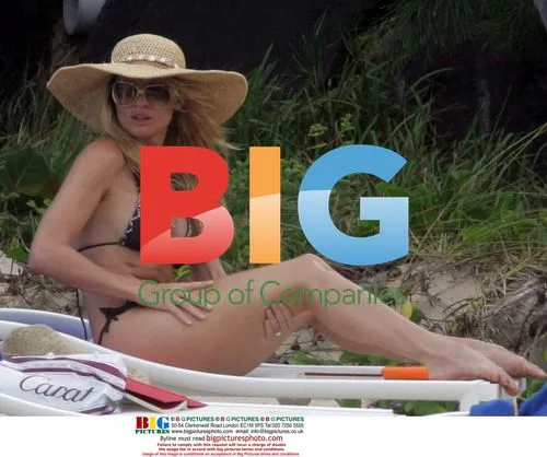 Nicollette Sheridan and Michael Bolton on Flamands beach in St Barts