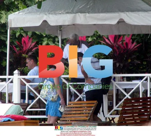 Sir Trevor McDonald vacations with ex-wife and son in Jamaica