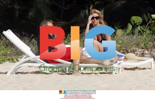 Nicollette Sherdian and Michael Bolton on Flamands beach in St Barts