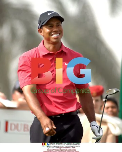 Tiger Woods Smiles in Sand Trap