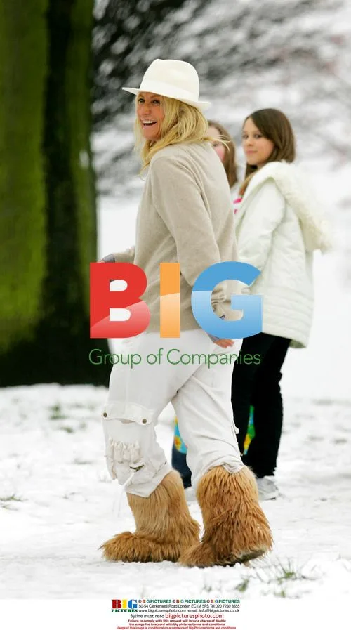 Meg Matthews and Daughter Sledging
