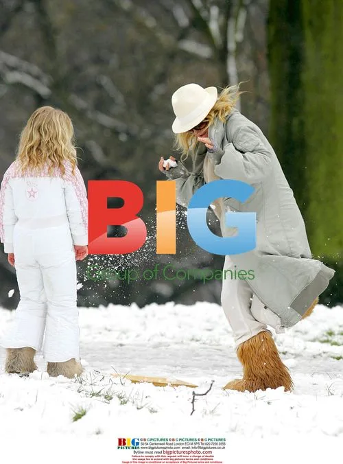 Meg Matthews and daughter Anais sledging