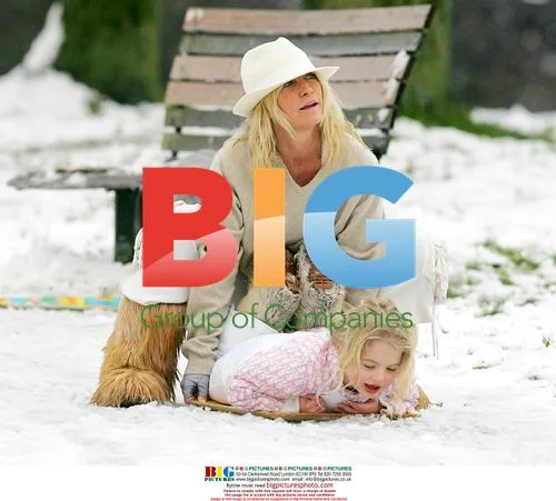 Meg Matthews and daughter Anais go sledging