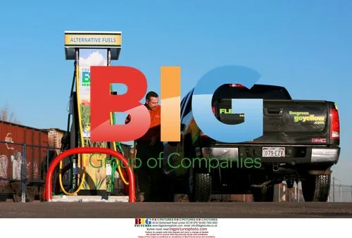 Mark McIntire pumps E85 ethanol fuel