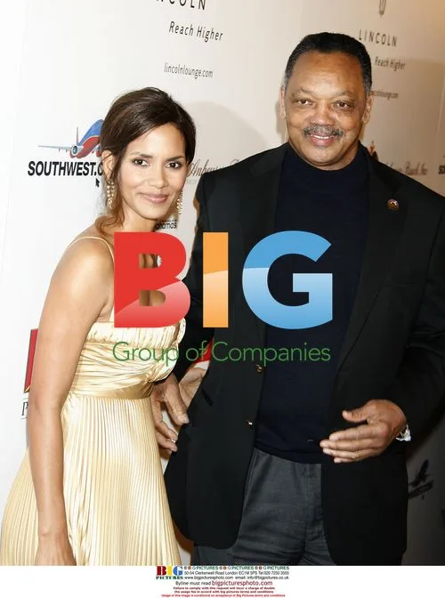 Halle Berry and Rev. Jesse Jackson at Ebony's Pre-Oscar Celebration