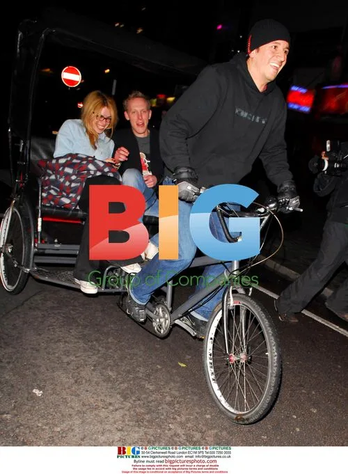 Billie Piper, Laurence Fox and Kris Marshall leave pub by rickshaw