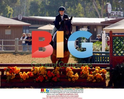 Portia de Rossi Competes in Equestrian Event
