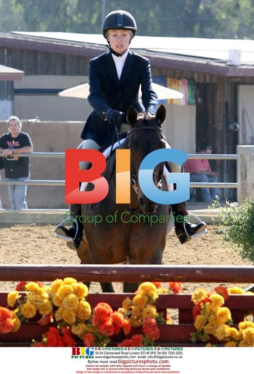 Portia de Rossi Competes in Equestrian Event