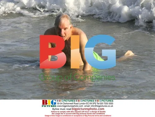 Steve Martin Frolicking with Girlfriend in Caribbean