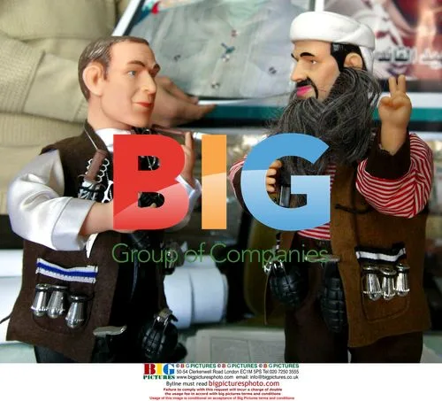 Palestinian Shopkeeper Displays Action Figures