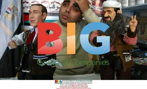 Palestinian Shopkeeper Displays Action Figures