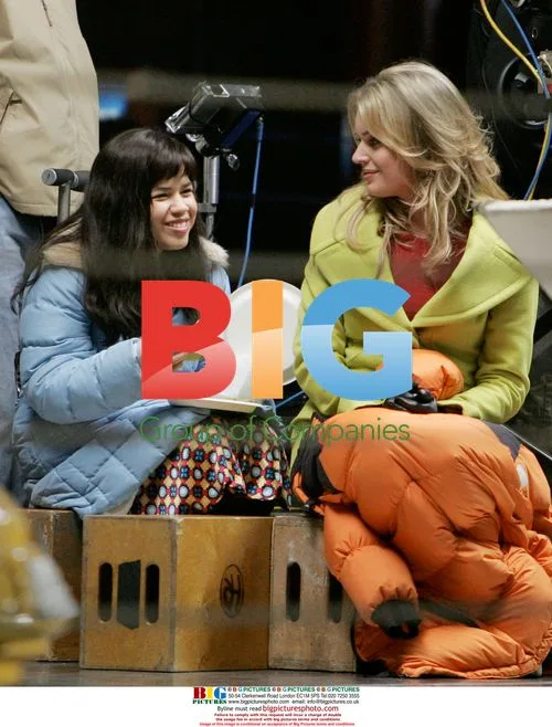 America Ferrera and Rebbeca Romijin on "Ugly Betty" set