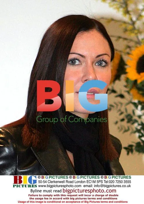 Violinist Linzi Stoppard Meets Simon Cowell at Sony BMG
