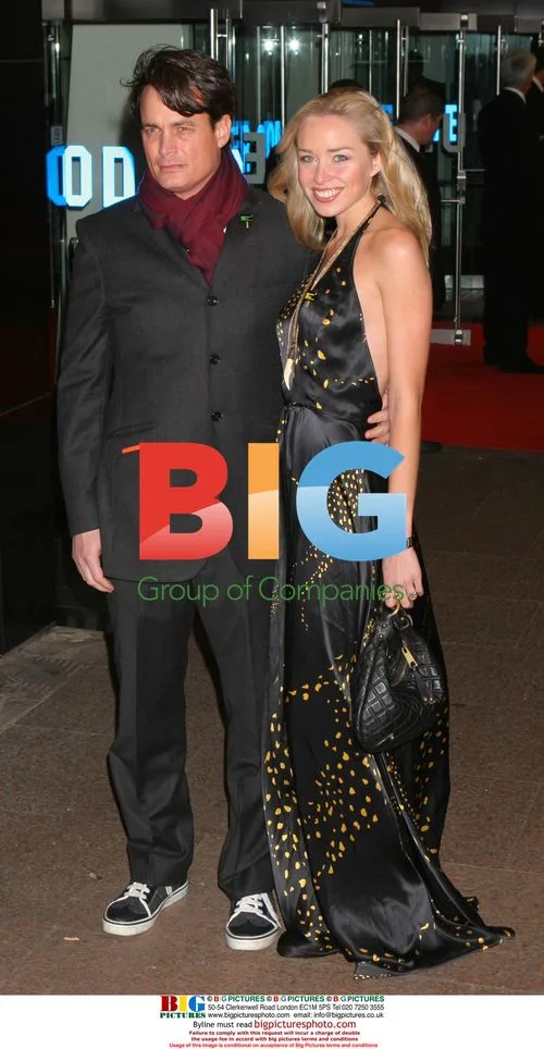Matthew Mellon and Guest at Blood Diamond Premiere