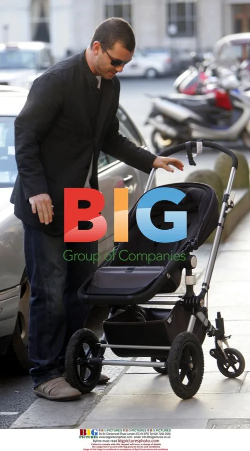 Gwen Stefani Assists Husband Gavin With Pushchair
