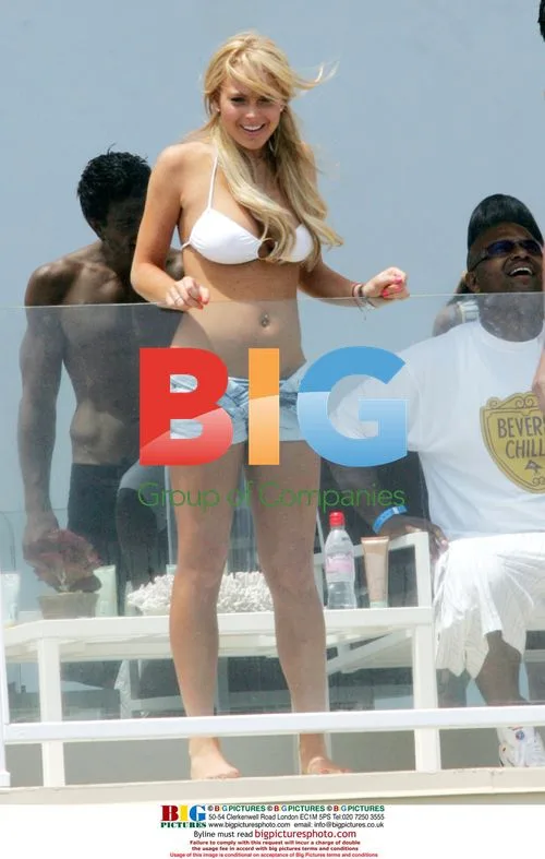 Lindsay Lohan Celebrates 4th of July in Malibu