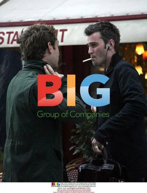 Jude Law chats with friends in London