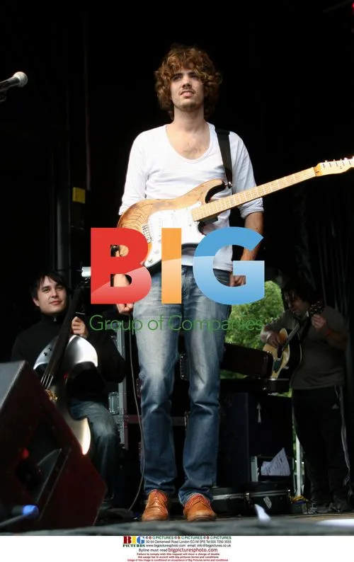 Musician Joins Band on Stage