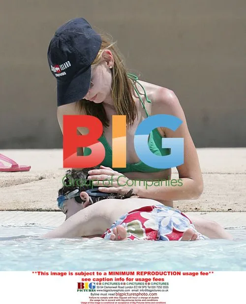 Calista Flockhart and son at the pool