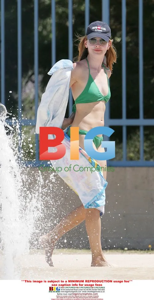 Calista Flockhart and son at pool