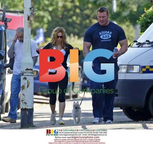 Geri Halliwell exercising with bodyguard and dog