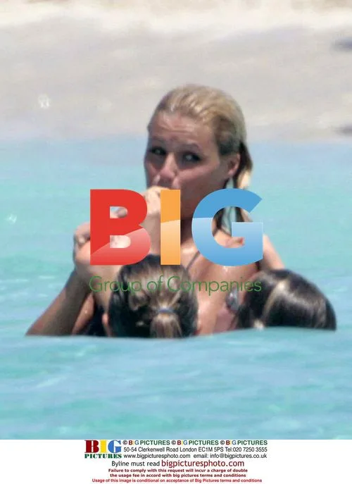 Michelle Hunziker on Holiday in Formentera