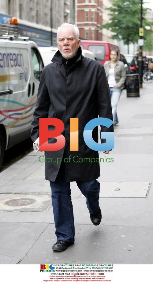 Roddy McDowall walking down Oxford Street