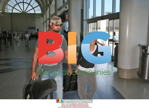 Josh Holloway and wife at LAX
