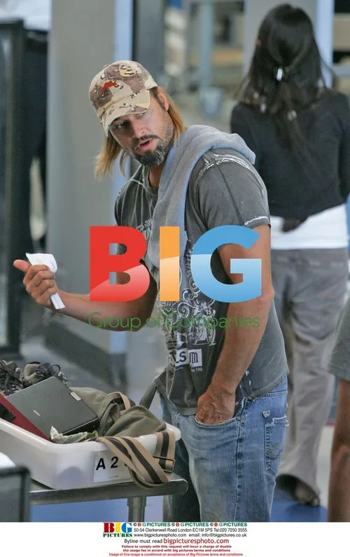 Josh Holloway and wife at LAX